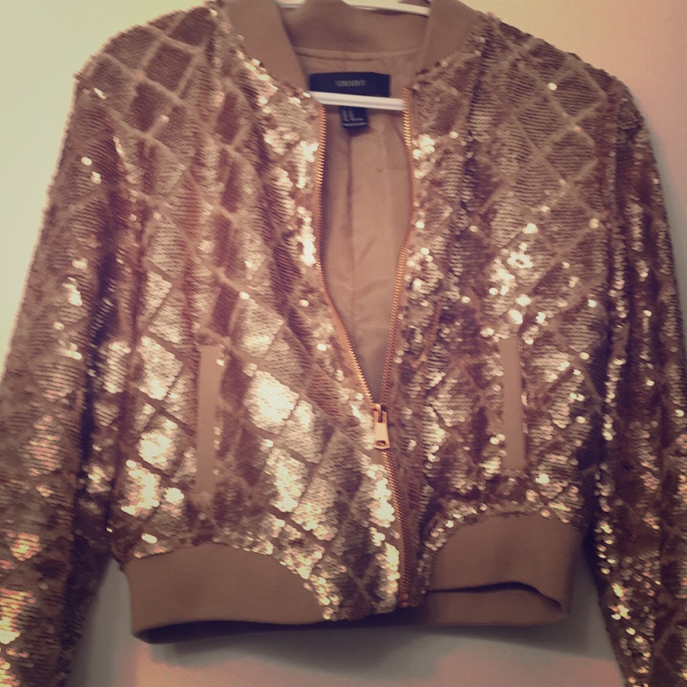 Rose-gold sequin bomber style jacket.